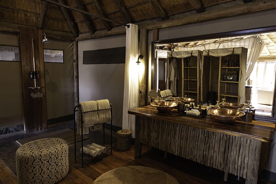 wilderness-savuti-campamento-tienda-baño