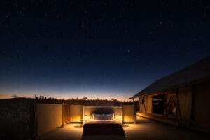 Each tented suite has a starbed on the deck which doubles as a daybed during the day. 