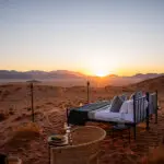 Book a sleep-out experience where you sleep Surrounded by desert dunes and under the stars. 