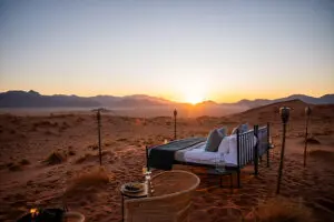 Book a sleep-out experience where you sleep Surrounded by desert dunes and under the stars. 