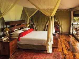 The rooms have real hardwood flooring, and each comfortable bed is fitted with protective mosquito netting.