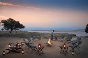 Sip on tall drinks around the boma fire as you marvel at the spectacular view of the Zambezi River.
