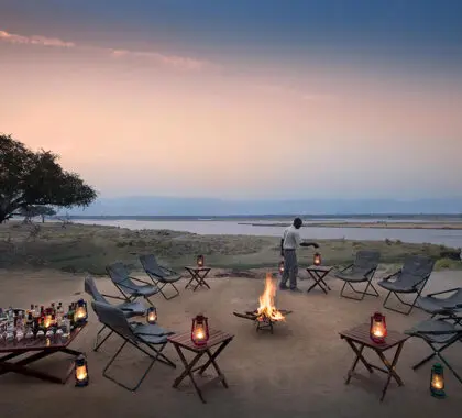 Sip on tall drinks around the boma fire as you marvel at the spectacular view of the Zambezi River.