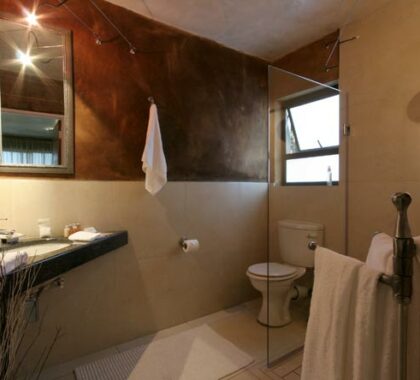 The en-suite bathrooms are stylish and modern, with a bath and full shower.