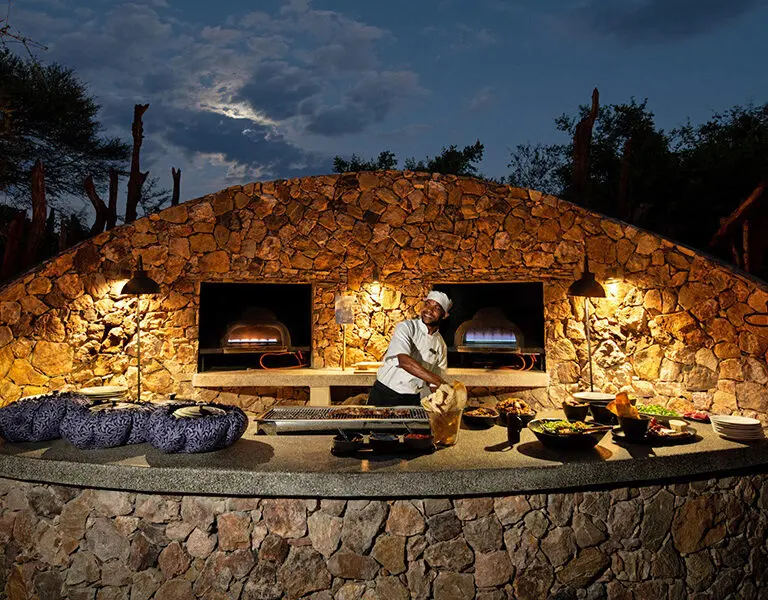 Experience a festive dinner in the boma.