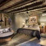 Each suite is suspended from the edge of the rocky cliff.