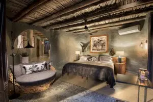 Each suite is suspended from the edge of the rocky cliff.
