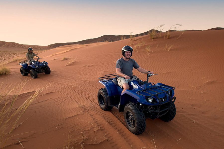 Explore the Sossusvlei desert on a quad bike.