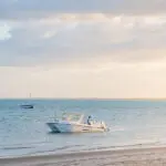 Cruise the Indian Ocean water by boat.