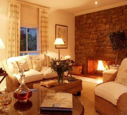 A cozy fireplace in the lounge keeps you warm on chilly evenings.