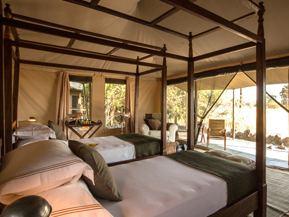 Roll-up canvas doors & windows allow the African sunlight to flood into your tented suite.