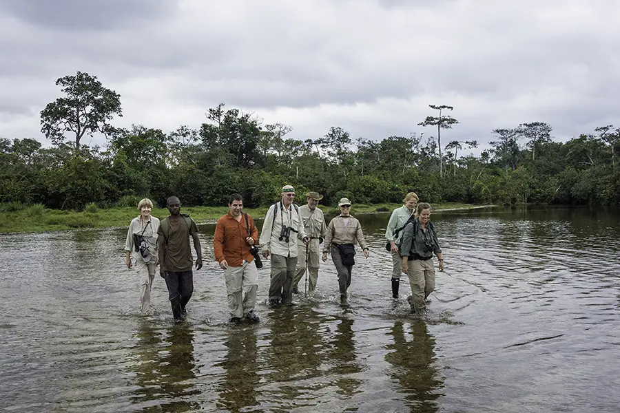 Wading through the Lekini River.