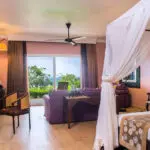 The Superior Junior Suite is light and airy with views of the ocean.