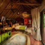 Bedroom interior at Jaci's Tree Lodge.