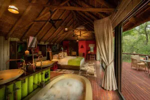 Bedroom interior at Jaci's Tree Lodge.
