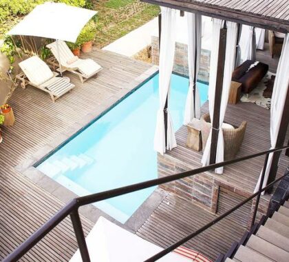 Cape Town's hot summer afternoons are best spent next to the pool on a comfortable lounger.
