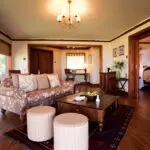 Catch up with emails or write a postcard or two in the Flamingo Suite's spacious lounge.
