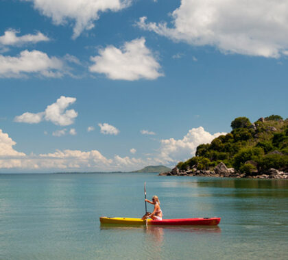 Lake Malawi's sheltered coastline & warm water make it perfect for a kayaking adventure.