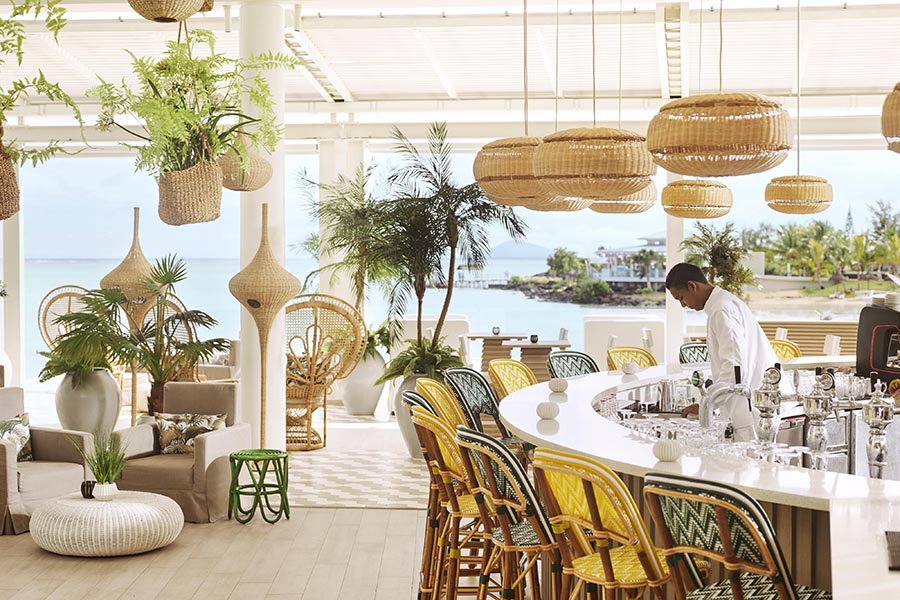 The Palm Court features live cooking stations with sit-up counters, chef encounters .