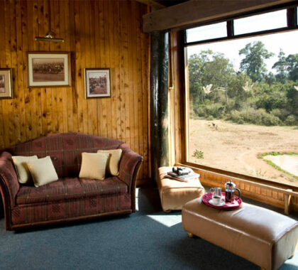 Each cabin-style room at the hotel overlooks the waterhole from its private balcony.