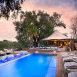 Watch an incredible sunset while relaxing outside by the pool.