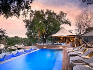 Watch an incredible sunset while relaxing outside by the pool.