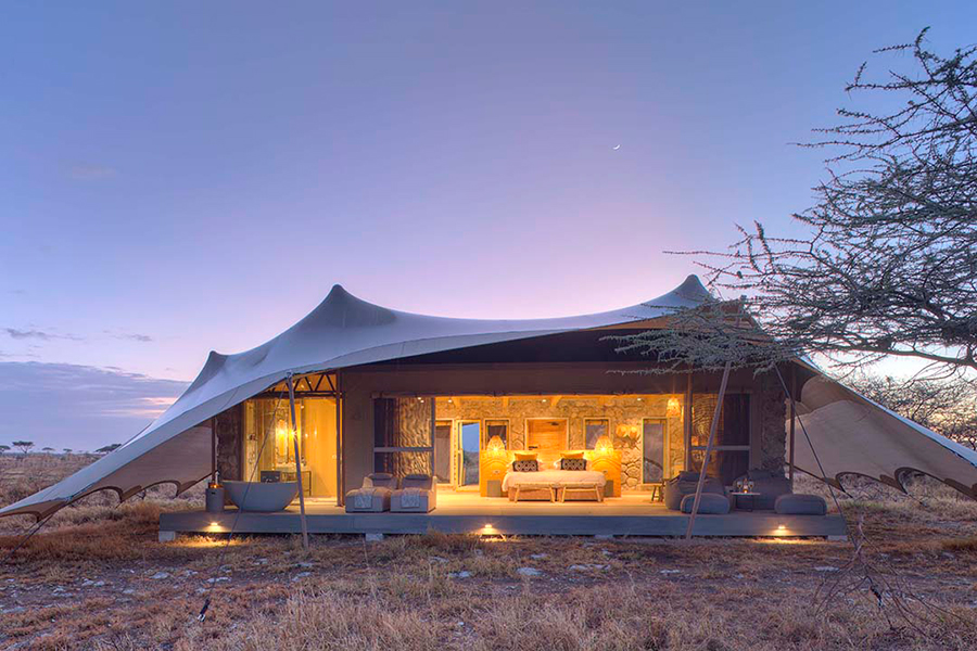Namiri tent exterior at dawn.