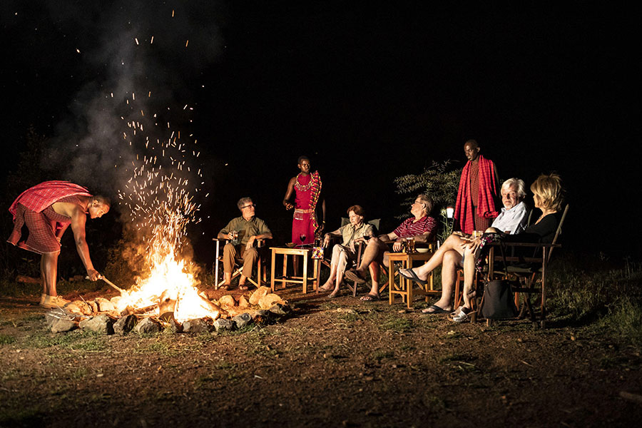 Share stories from the day around a traditional camp fire.