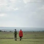 Stroll beside the Maasai on guided walks at Porini Mara Camp.