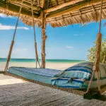 Disfrute de una siesta en la playa.