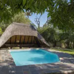 Cool off in the lodge's swimming pool or simply relax under a shady tree.