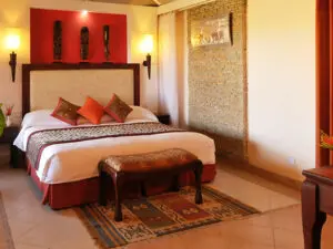 The comfortable chalet-style rooms are equipped with fans, safes and tea and coffee-making facilities.