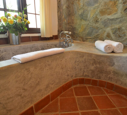 Equipped with separate showers and large, hand-built bathtubs.