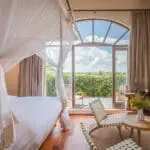 The lucent Tower Room has some of the best views of Nairobi National Park and the Ngong Hills.