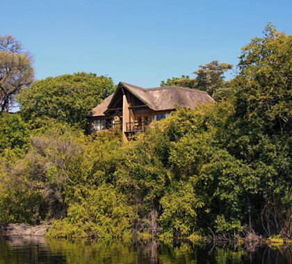 Namushasha River Lodge is situated on the banks of the Kwando River, overlooking a hippo pool.