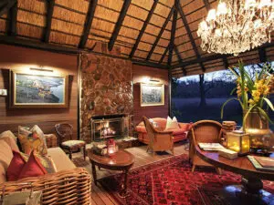 The exquisite décor, thatch roof and chandelier in the main lounge strike the perfect balance between African bush and luxury.