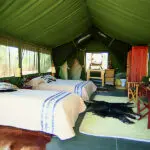 Twin bedroom at Porini Amboseli Camp.