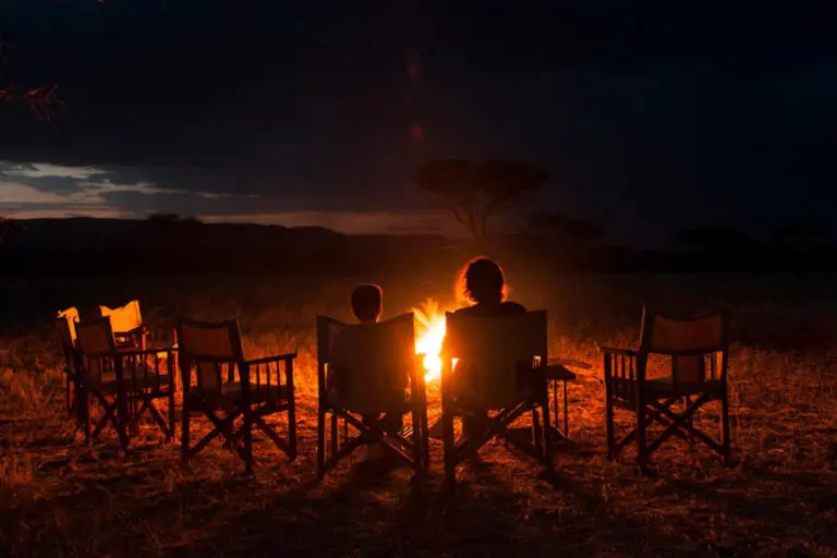 Enjoy a camp fire at Serengeti Kati Kati Camp.
