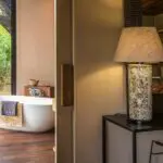 Qorokwe's tented suites are elegant and equipped with en suite bathrooms.
