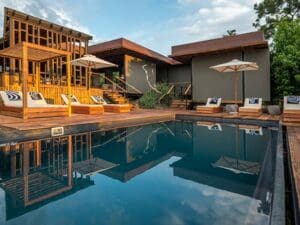 Enjoy a dip in the pool or curl up with a good book in one of the day beds.