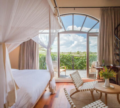 The lucent Tower Room has some of the best views of Nairobi National Park and the Ngong Hills.