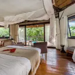 Spacious rooms with private decks at Lemala Wildwaters Lodge.