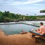 Take a dip in the pool and relax on the loungers.