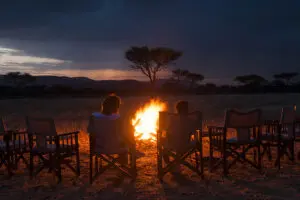 Evenings are for exchanging stories and unforgettable safari moments around the campfire.