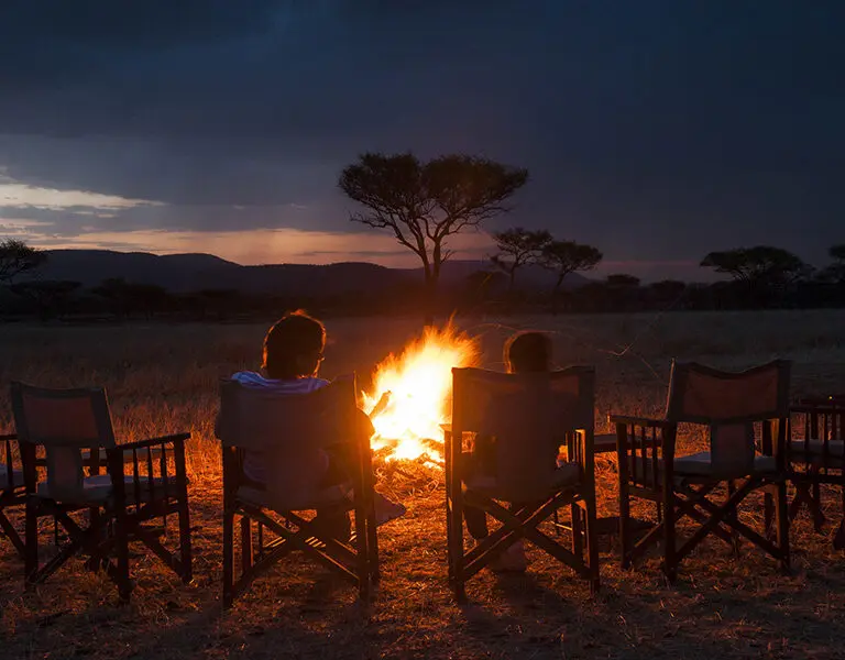 Evenings are for exchanging stories and unforgettable safari moments around the campfire.
