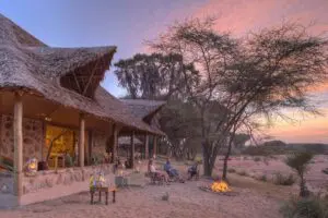 Camp fire at sunset at Saruni Rhino.