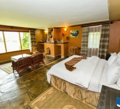 Stay in the ultimate bush bedroom with stone floors and a fire place to ward off the evening chill.