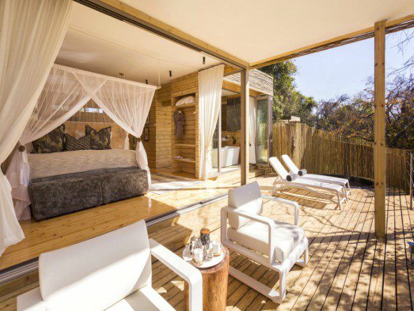 The elegant, open-plan Treehouse Suites have sliding glass doors that open onto private decks, equipped with plunge pools and comfortable armchairs.