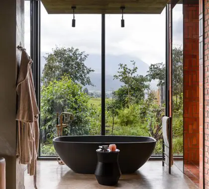 Spacious bathrooms are en suite with bathtubs.