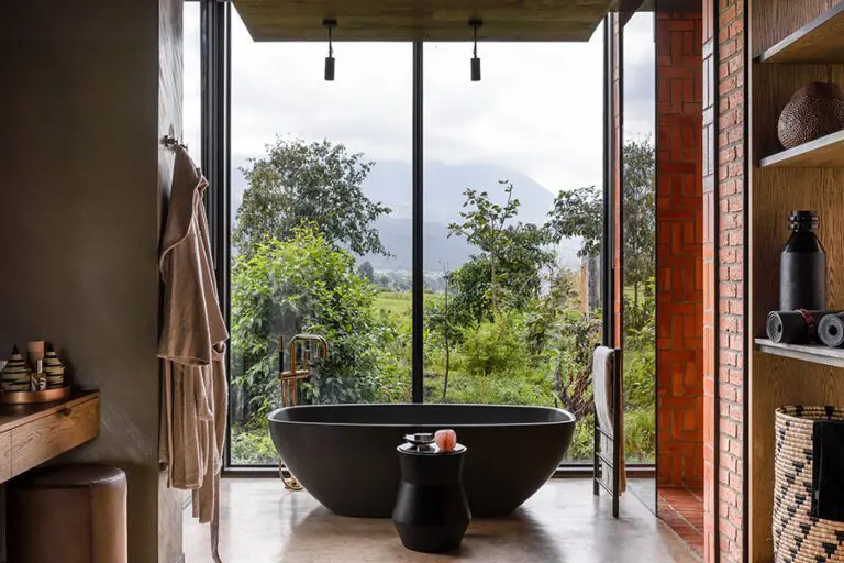 Spacious bathrooms are en suite with bathtubs.